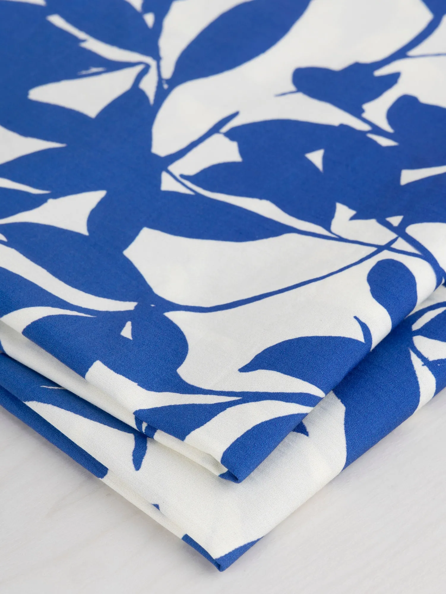 Foliage Silhouette Print Cotton Poplin - Cream   Cobalt - Swatch